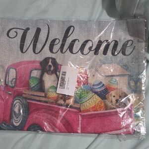 Colorful Welcome Mat with Easter Eggs and Dogs